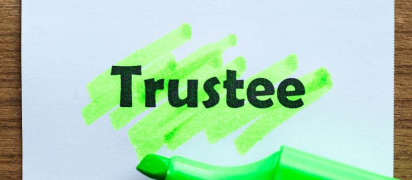 Trustee written on a piece of paper