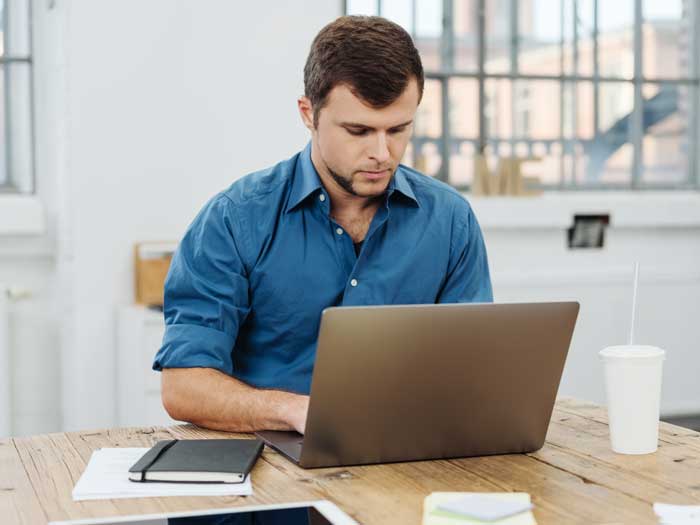 Male student applying for job. Shutterstock.com/stockfour