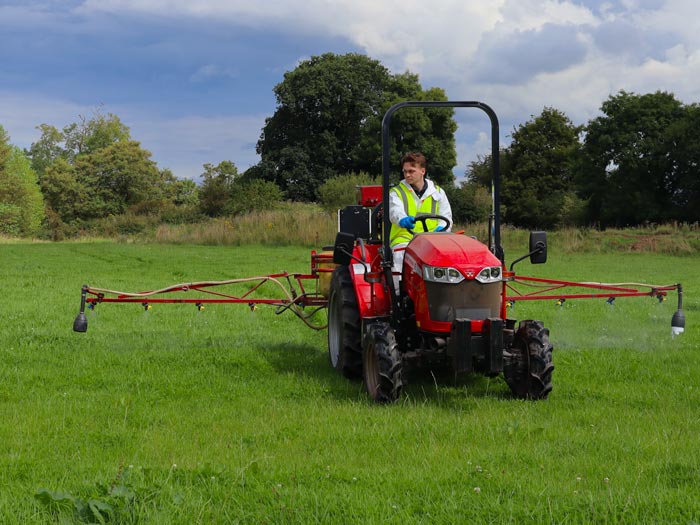 Jonathan Hoard drives a sprayer as part of an assessment during a training course at Harper Adams University.