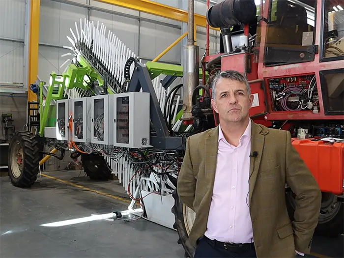 Mark Evans, CEO of Upcycled Plant Power, stood in front of his broccoli harvester. Picture: Riccardo Magliola/tiah.org.