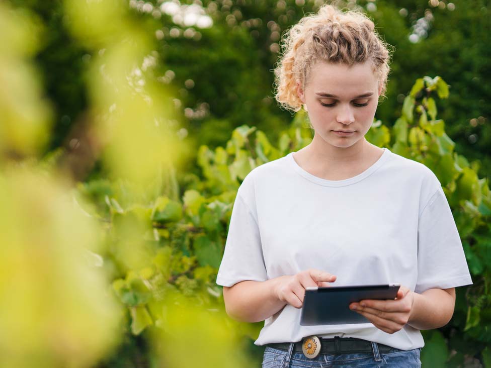 Young farmer assesses her training options. iStock.com/Strelciuc Dumitru