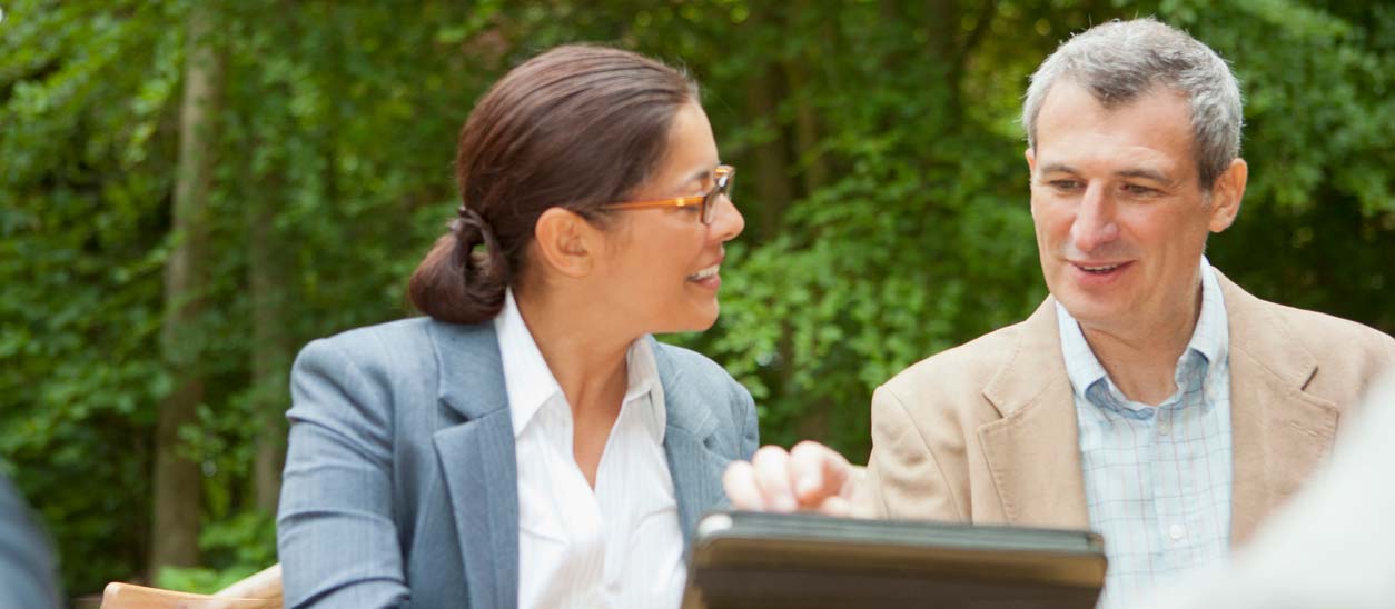 Staff look over their data-driven objectives. iStock.com/Bill Sykes