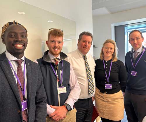 Minister Spencer (centre) with some of the new entrants at the roundtable meeting.