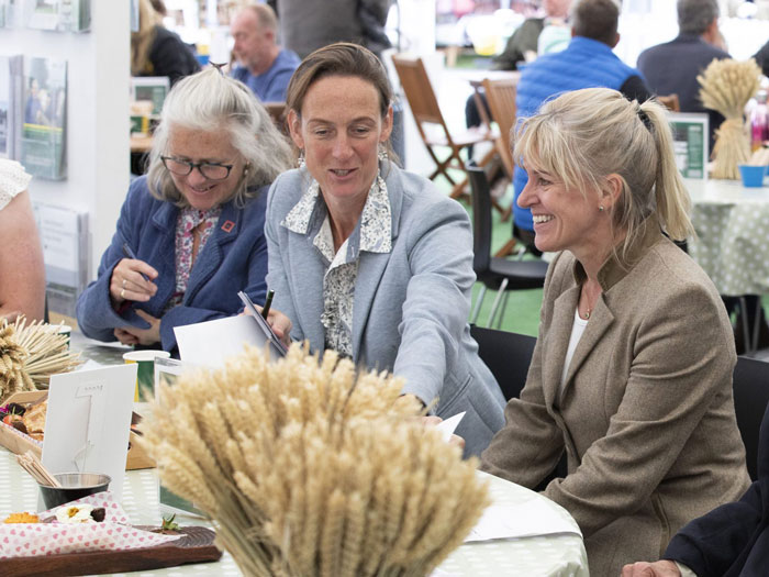 Ruthie Peterson is leading TIAH's work with the ICAP group - seen here talking with former NFU President, Minette Batters.